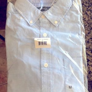 Men’s long sleeve dress shirt in denim blue.